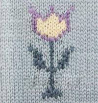 Фото цветок интарсией №4246 спицами